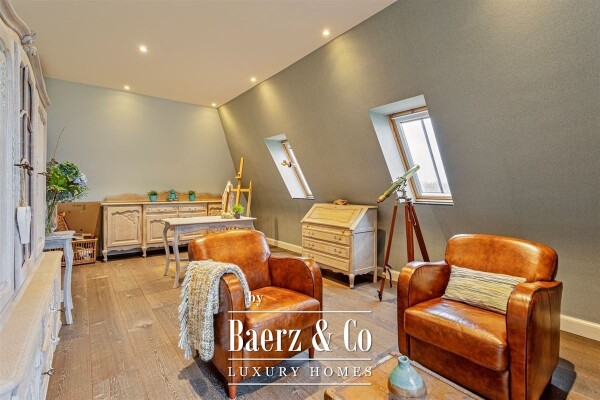 photo 32 Uitzonderlijke Duplex met zicht op kanaal, garage, carport en ruime (wijn)kelder!